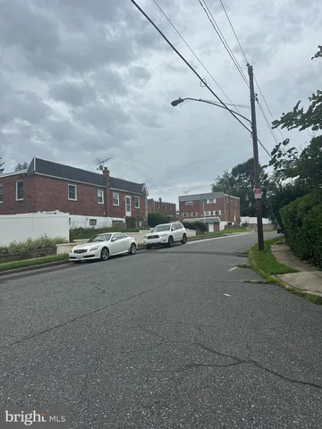 a city view with houses and a street