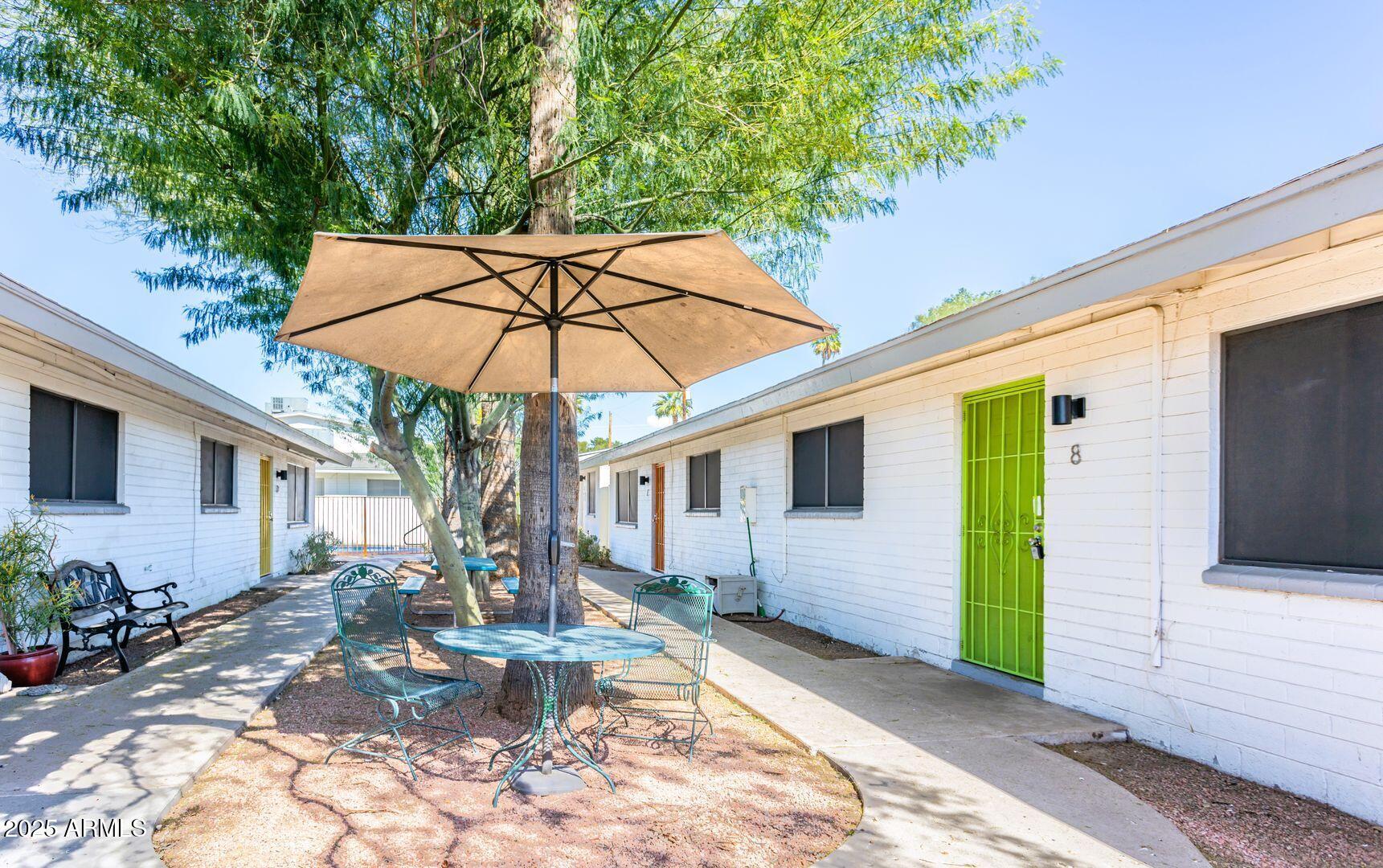 1623 West Missouri Avenue, Unit 1 Phoenix, AZ 85015 - Photo 12 of 12 a view of a house with backyard and sitting area