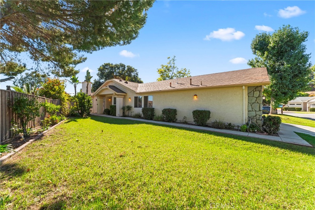 14720 Marymount Street Moorpark, CA 93021 - Photo 2 of 22 a front view of a house with swimming pool