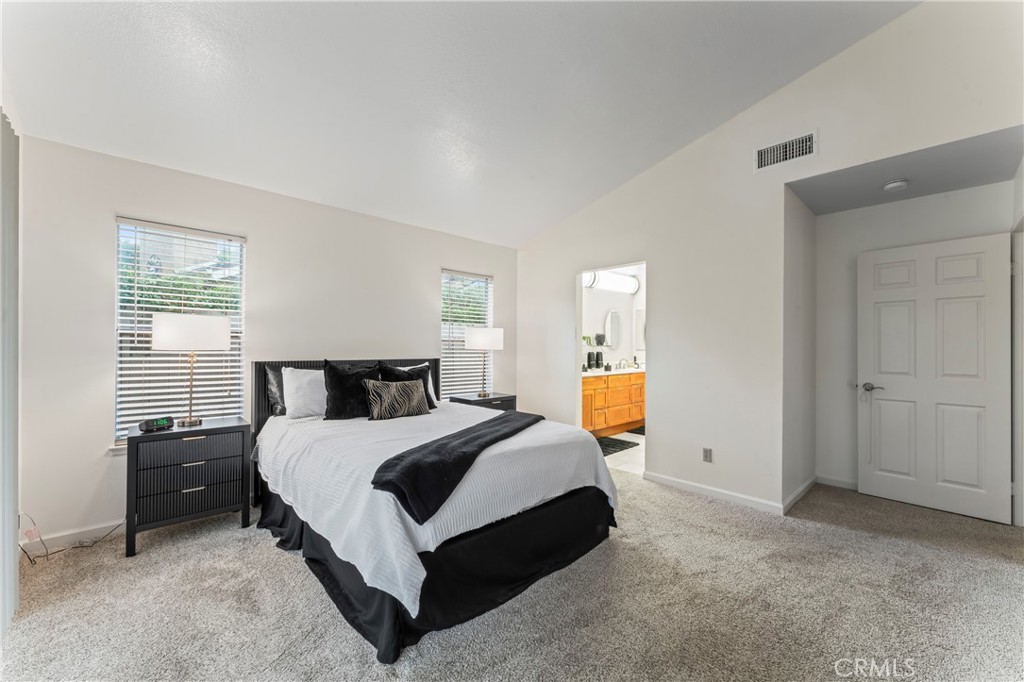 14720 Marymount Street Moorpark, CA 93021 - Photo 6 of 22 a spacious bedroom with a bed and window
