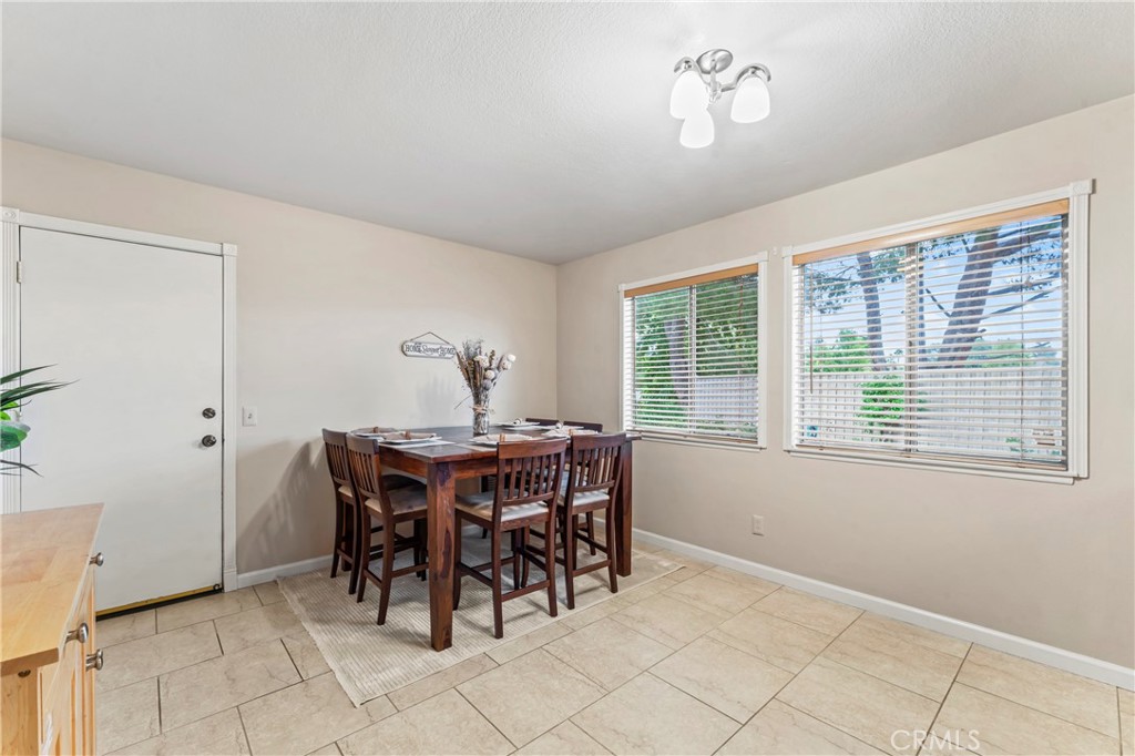 14720 Marymount Street Moorpark, CA 93021 - Photo 10 of 22 a view of a dining room with furniture and chandelier