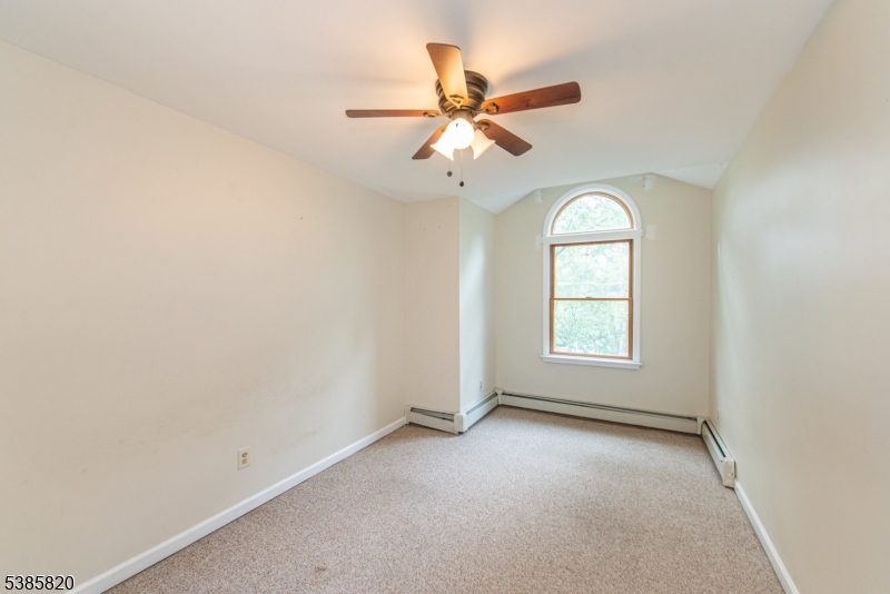 40 Castle Rock Road Lake Hopatcong, NJ 07849 - Photo 12 of 20 an empty room with a window and a fan