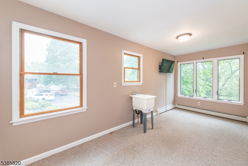 40 Castle Rock Road Lake Hopatcong, NJ 07849 - Photo 13 of 20 a view of an empty room with a window