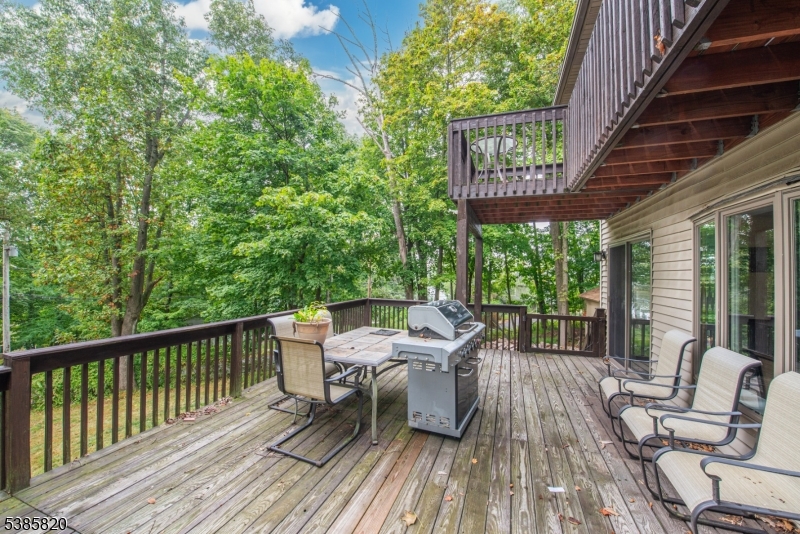 40 Castle Rock Road Lake Hopatcong, NJ 07849 - Photo 20 of 20 a view of a patio with a table and chairs