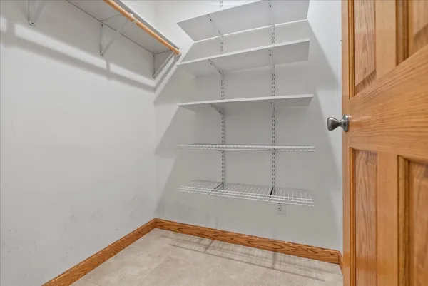 a view of an empty walk in closet