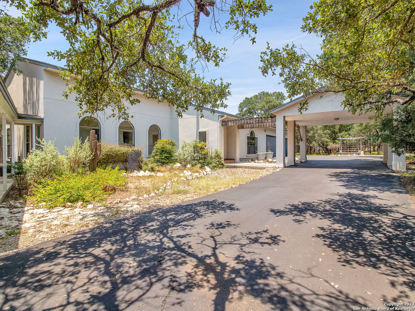 211 Fawn Lane Spring Branch, TX 78070 - Photo 1 of 1 a front view of a house with a yard and trees