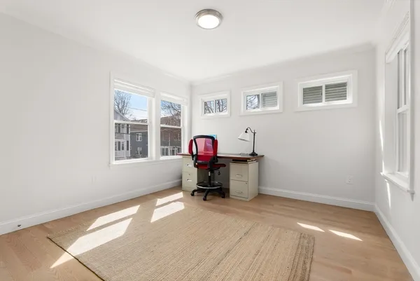 a view of a livingroom with furniture and furniture