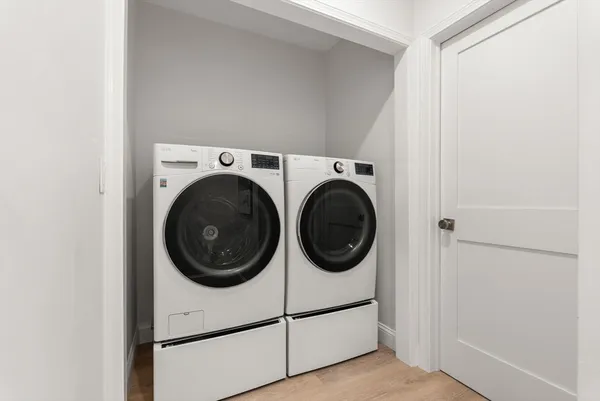 a utility room with dryer and washer