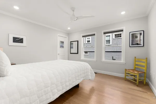 a bedroom with a bed and furniture