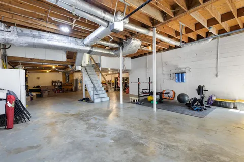 a view of a garage with white walls