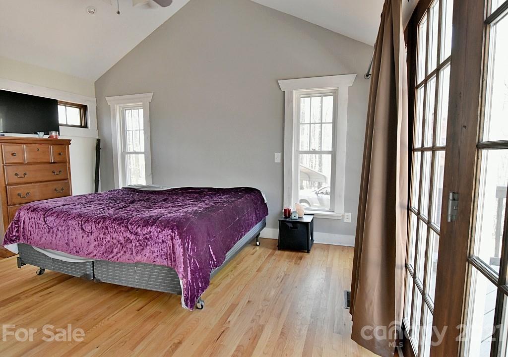 2087 Mission Road York, SC 29745 - Photo 13 of 30 a bedroom with a bed and a flat screen tv