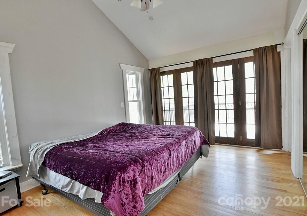 2087 Mission Road York, SC 29745 - Photo 14 of 30 a bedroom with a large bed and a large window