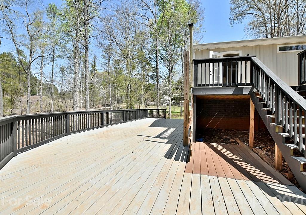 2087 Mission Road York, SC 29745 - Photo 21 of 30 a view of balcony with wooden floor and fence
