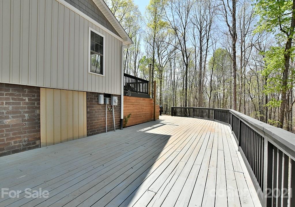 2087 Mission Road York, SC 29745 - Photo 22 of 30 a view of balcony with wooden floor and fence