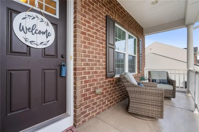 a bench sitting in front of a door