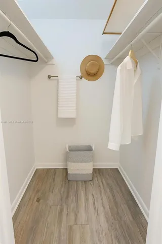 a bathroom with a sink a toilet and a shower