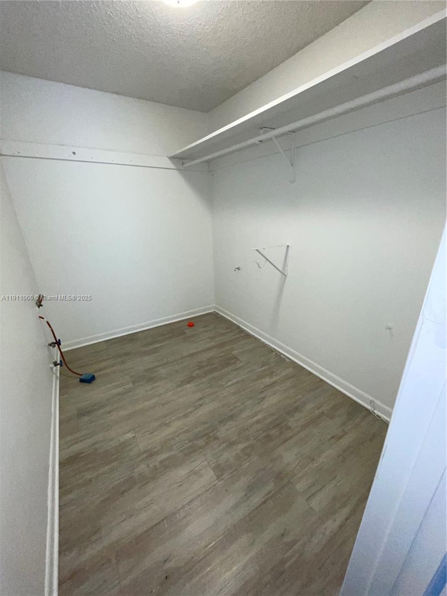 227 Castlewood Drive, Unit 102 North Palm Beach, FL 33408 - Photo 22 of 26 a view of an empty room