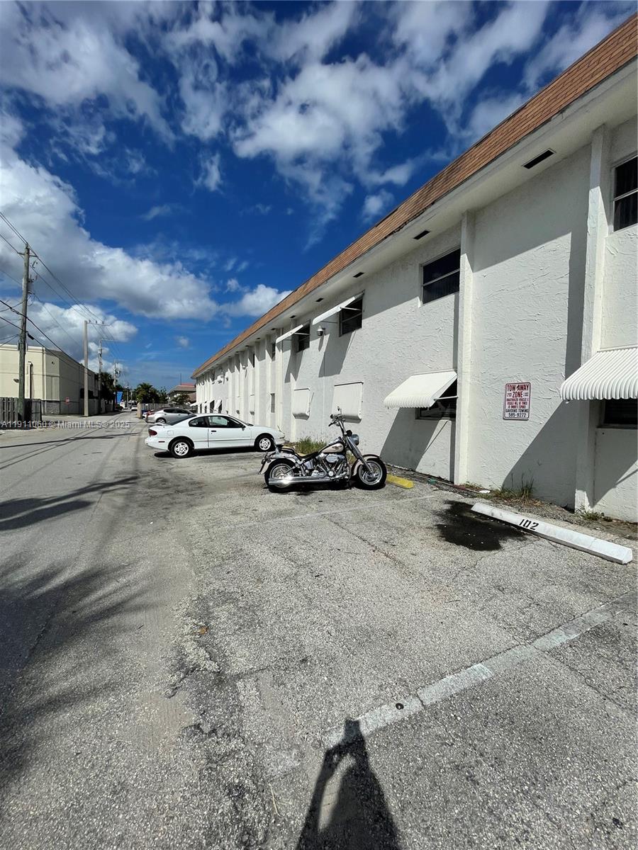 227 Castlewood Drive, Unit 102 North Palm Beach, FL 33408 - Photo 26 of 26 a view of parking