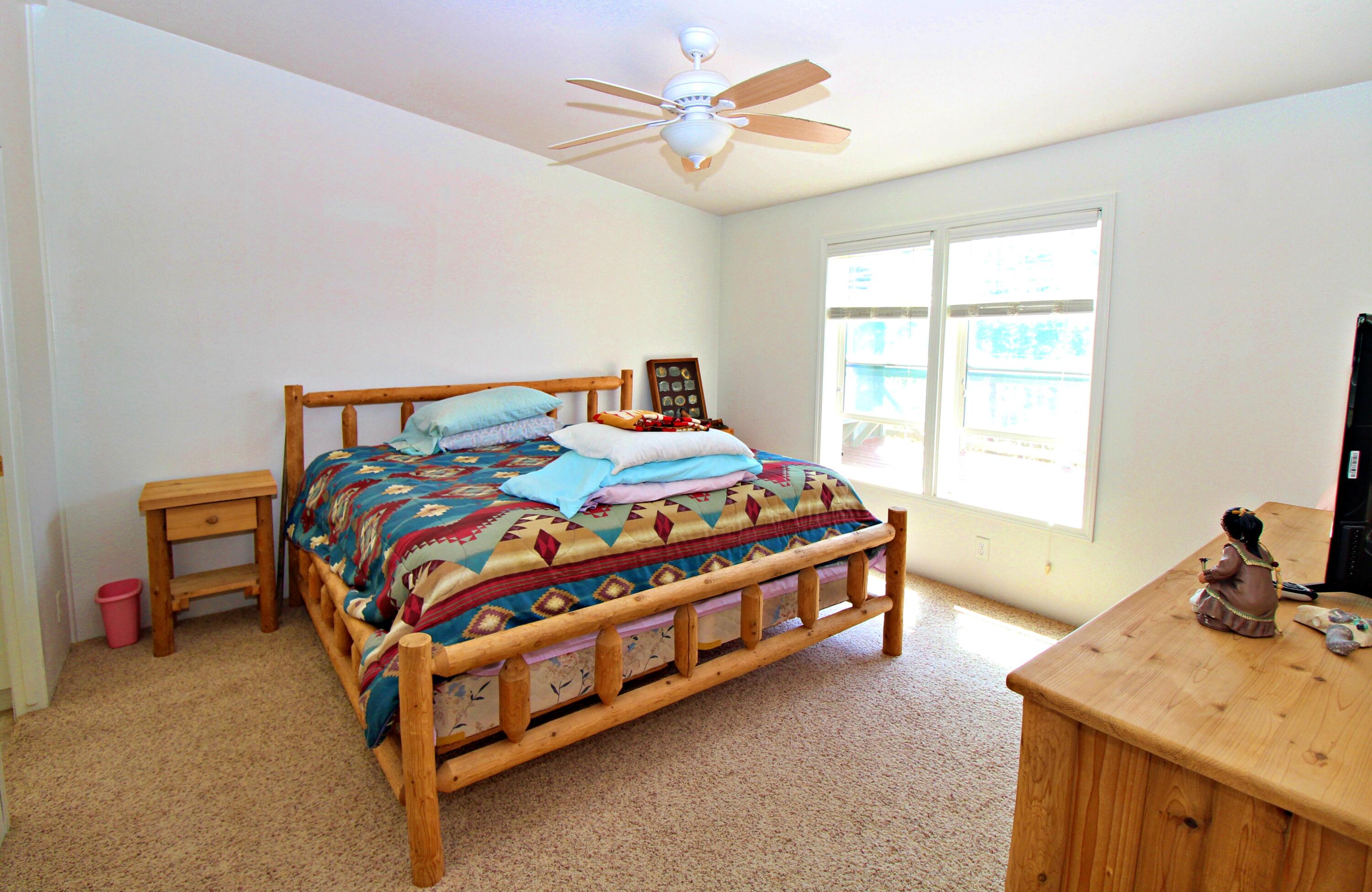 7732 North Applegate Road Grants Pass, OR 97527 - Photo 19 of 40 Master bedroom