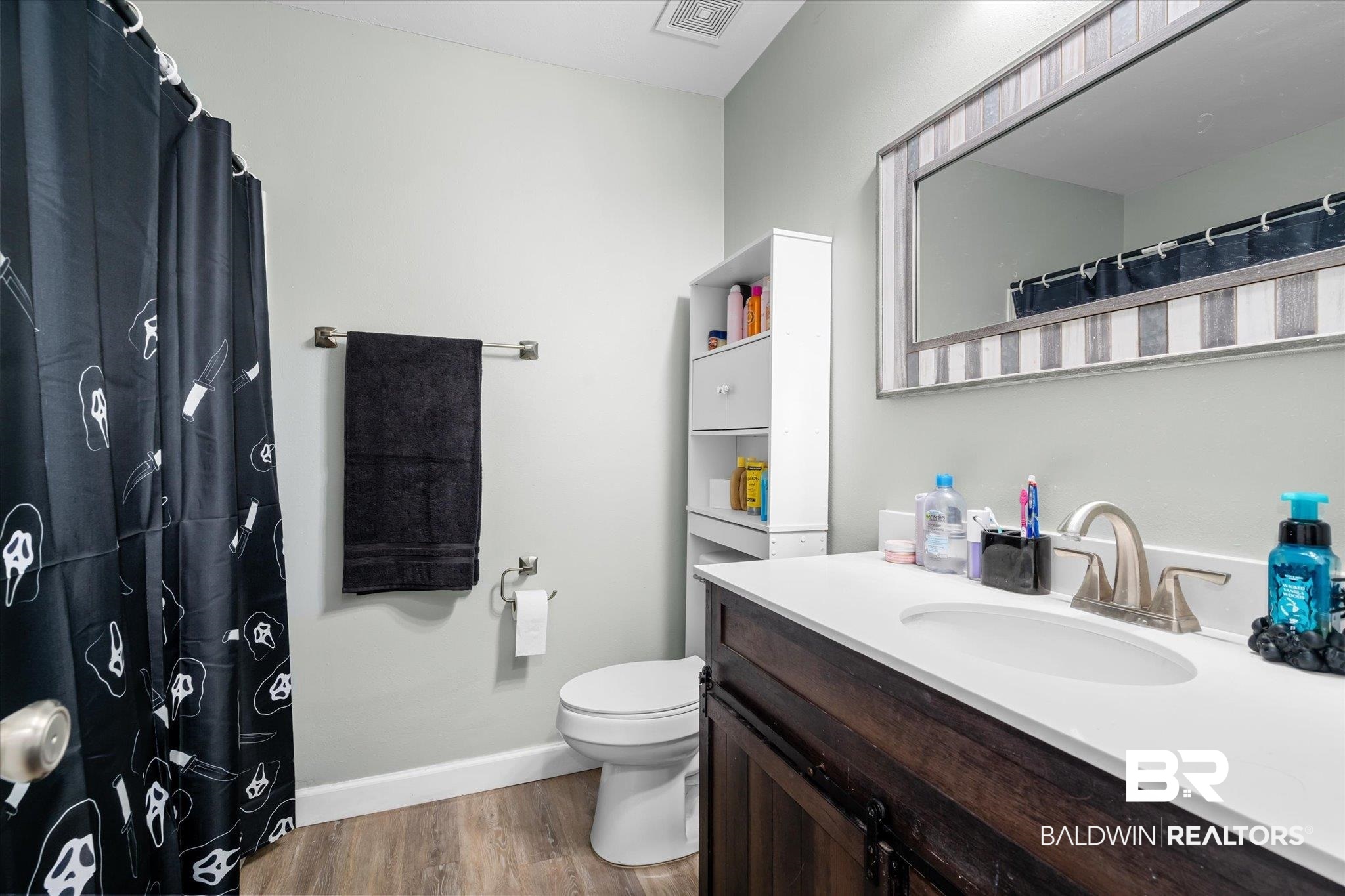 9987 Downing Street Semmes, AL 36575 - Photo 14 of 20 Bathroom with wood-type flooring, toilet, and vanity