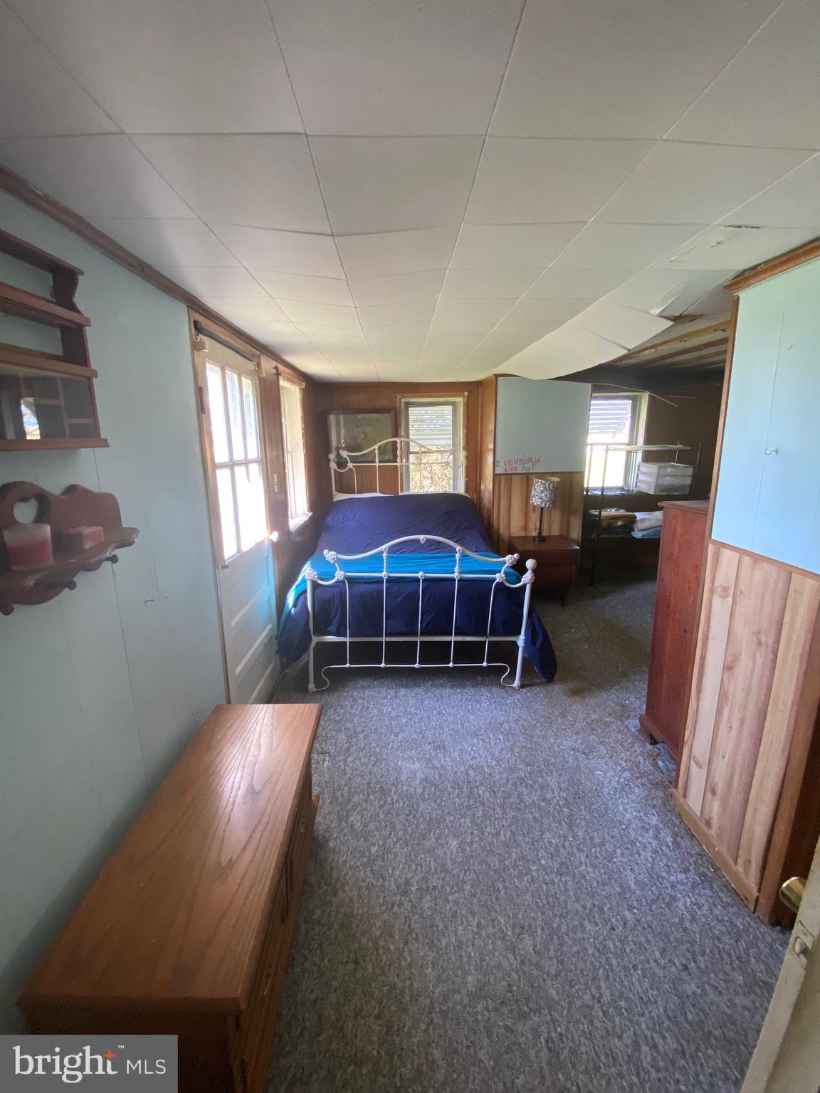 3251 Marsh Road Ewell, MD 21824 - Photo 16 of 23 a view of a livingroom with furniture and window