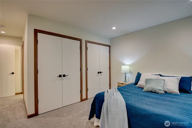 a bathroom with a shower and toilet