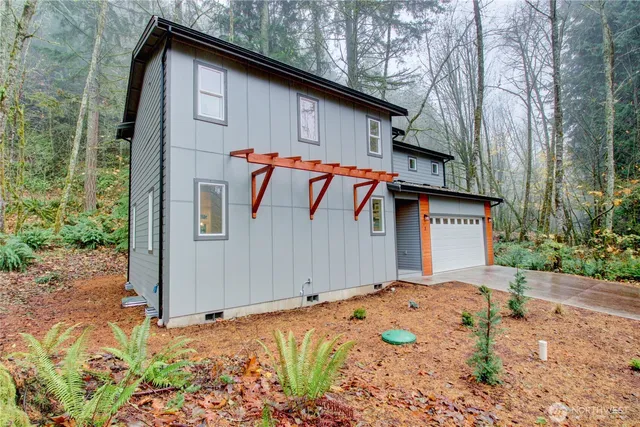 a backyard of a house with lots of green space