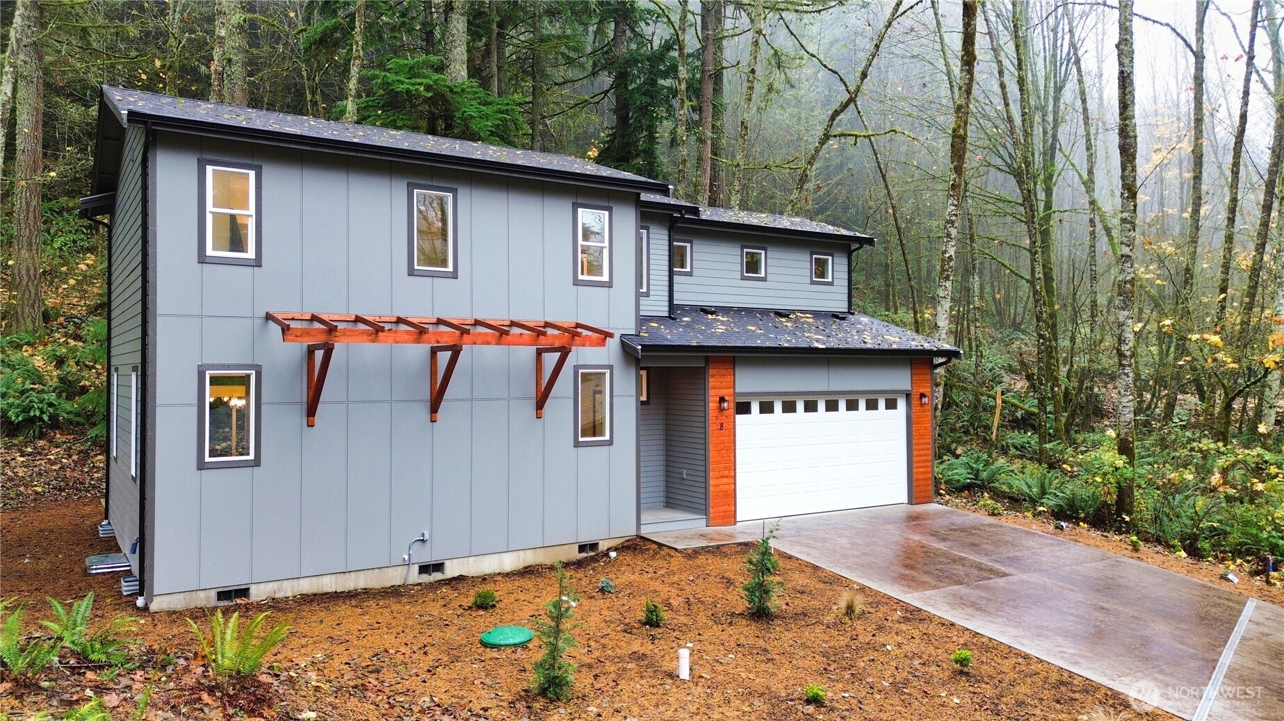 8 Shetland Court Bellingham, WA 98229 - Photo 35 of 40 a front view of a house with garage