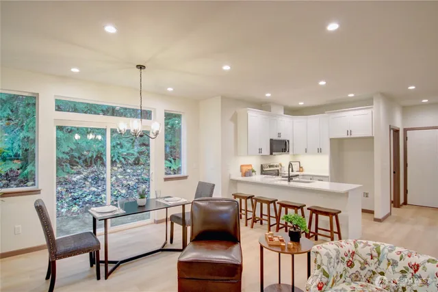 a view of house with backyard