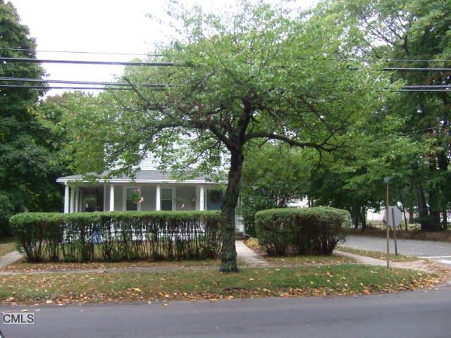 91 Huntington Road Stratford, CT 06614 - Photo 1 of 1 a view of a house with a garden