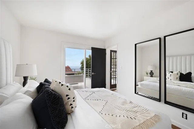 a view of a workspace with furniture and a potted plant
