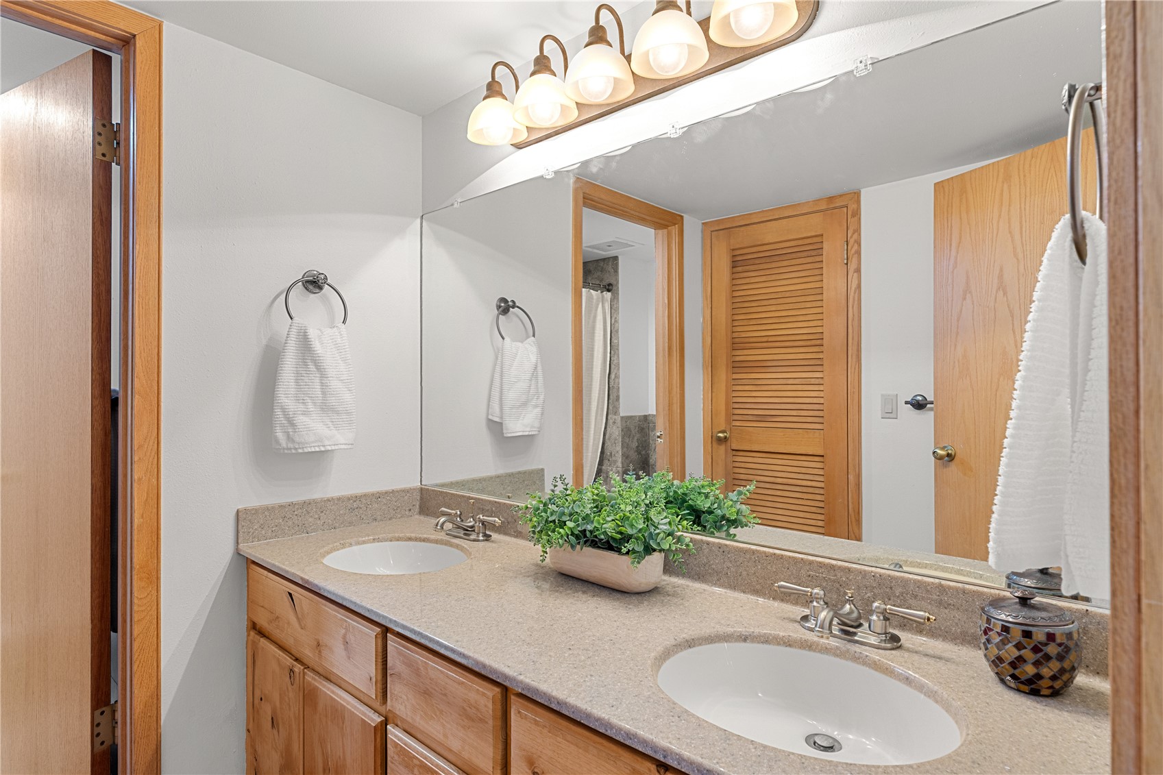 22804 Highway 6, Unit 102 Keystone, CO 80435 - Photo 22 of 34 a bathroom with a sink and a mirror