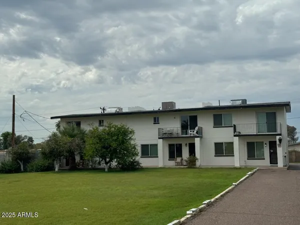 a house view with a garden space