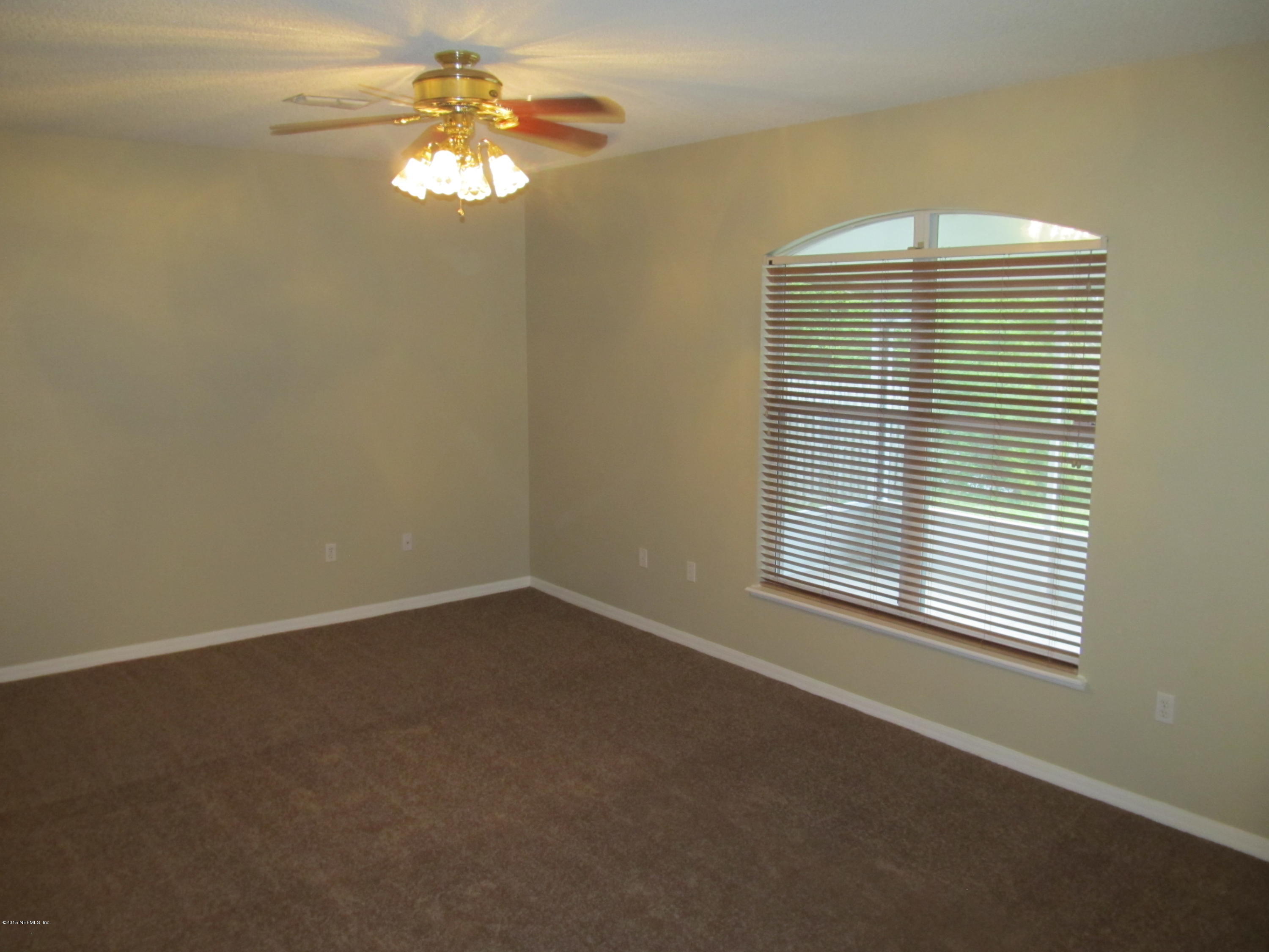 7079 Prosperity Park Road East Jacksonville, FL 32244 - Photo 10 of 22 a view of a livingroom with a window