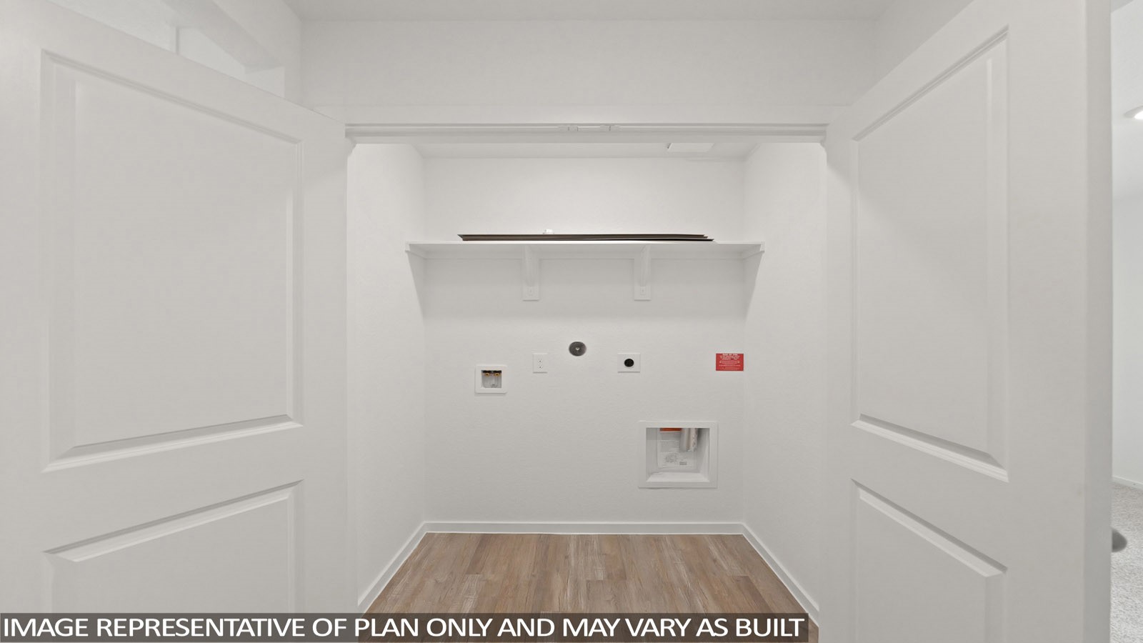 19956 Hilbert Road New Caney, TX 77357 - Photo 17 of 27 a view of walk in closet with clothes