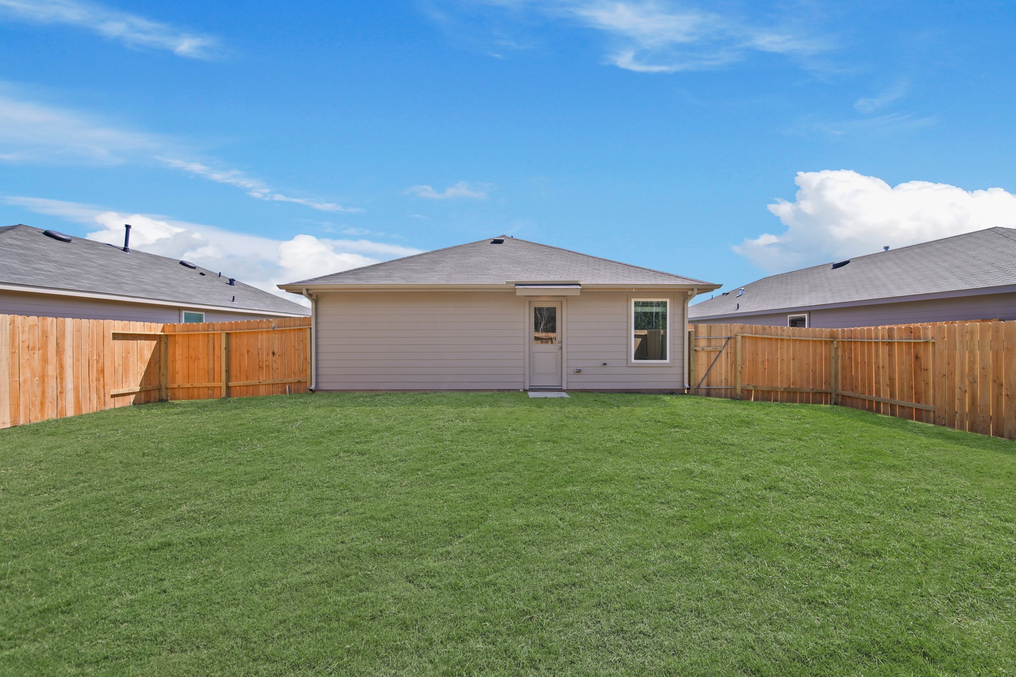 19956 Hilbert Road New Caney, TX 77357 - Photo 20 of 27 a view of a backyard with a garden