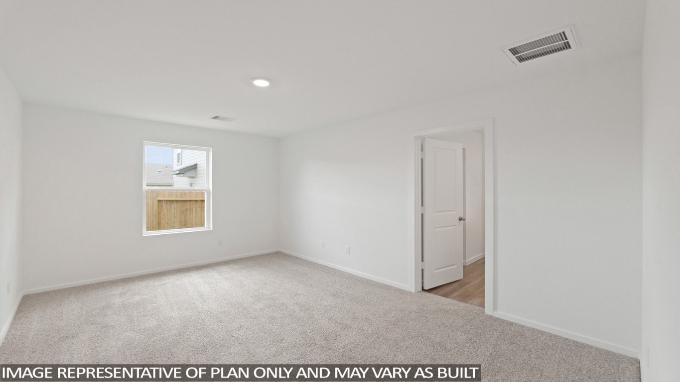 19956 Hilbert Road New Caney, TX 77357 - Photo 10 of 27 a view of an empty room with a window