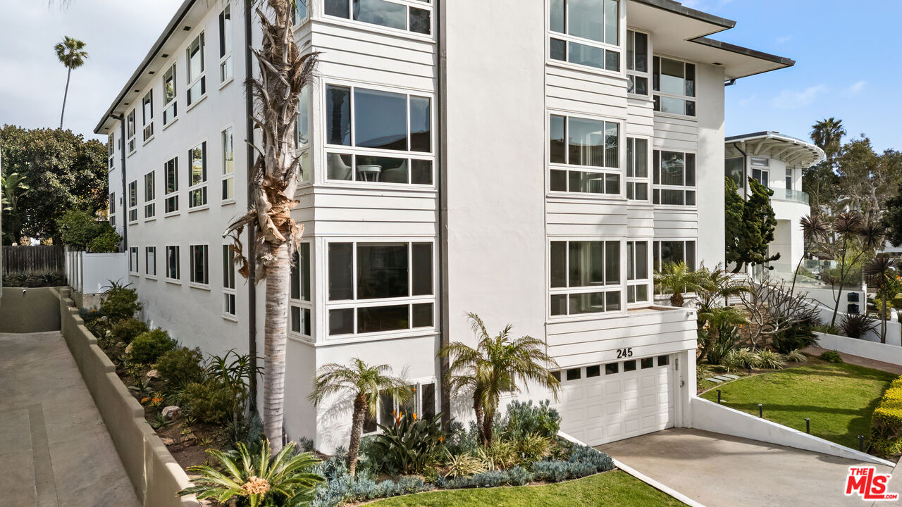 245 Coast Boulevard, Unit A2 La Jolla, CA 92037 - Photo 18 of 18 a front view of a multi story residential apartment building