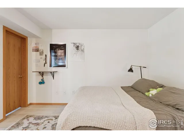 a bedroom with a bed and a view of bathroom