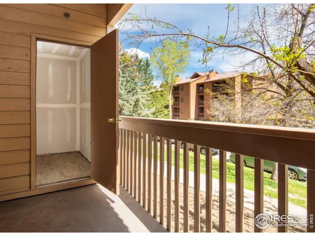 a view of a balcony with an outdoor space