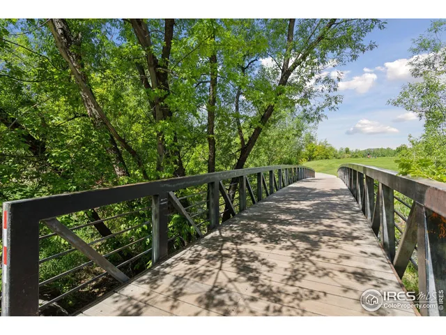 a view of balcony with wooden floor