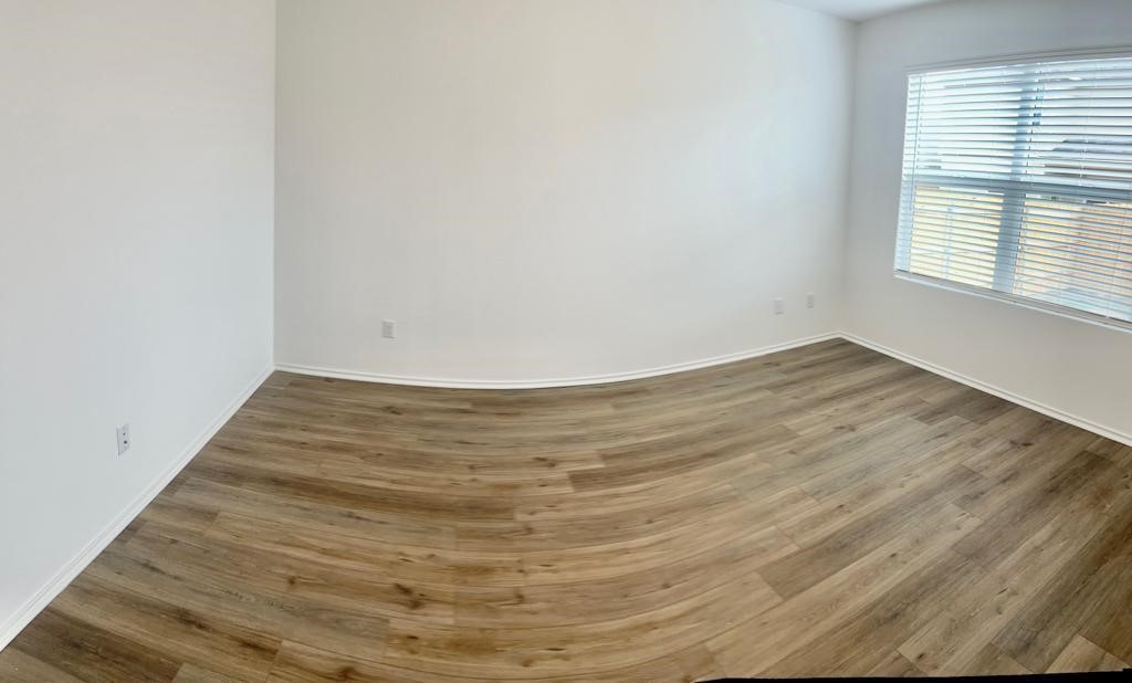 420 Perfect World Loop Jarrell, TX 76537 - Photo 13 of 17 a view of wooden floor and windows in a room