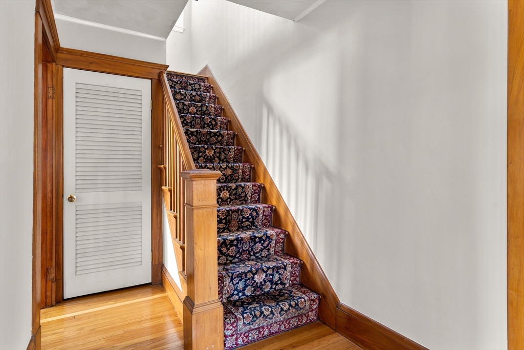 15 Laird Road Medford, MA 02155 - Photo 13 of 42 a view of room with wooden floor