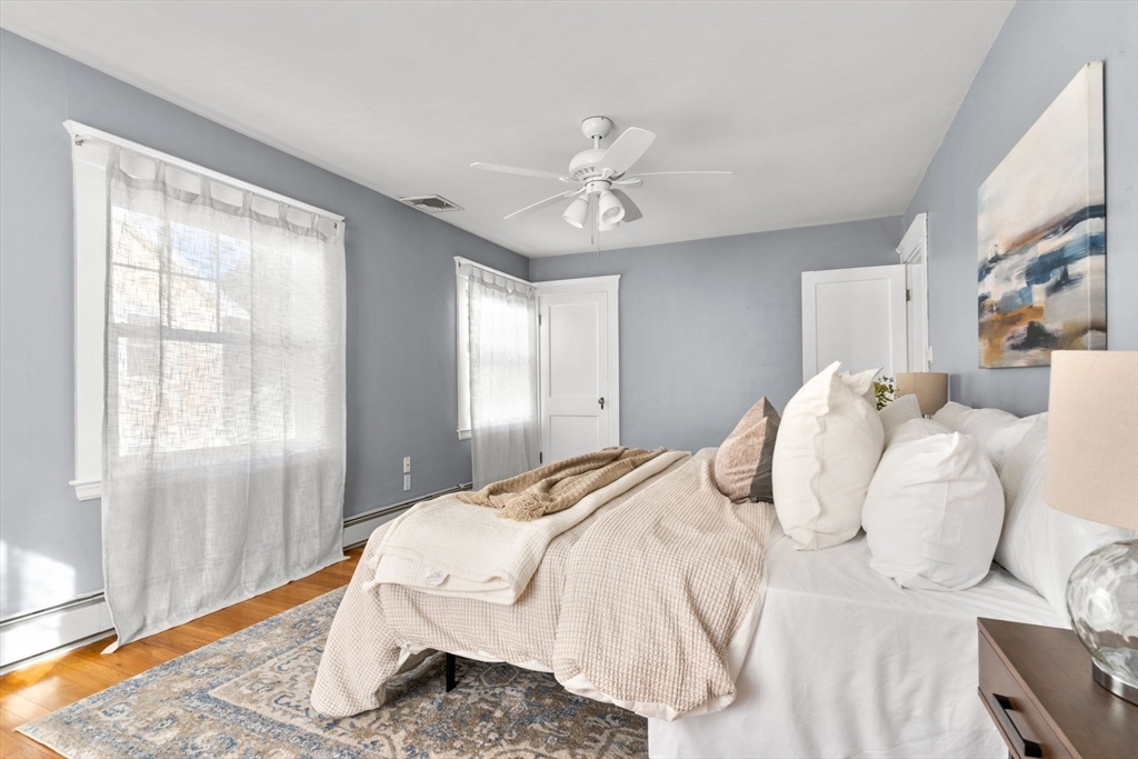 15 Laird Road Medford, MA 02155 - Photo 16 of 42 a bedroom with a bed and a window