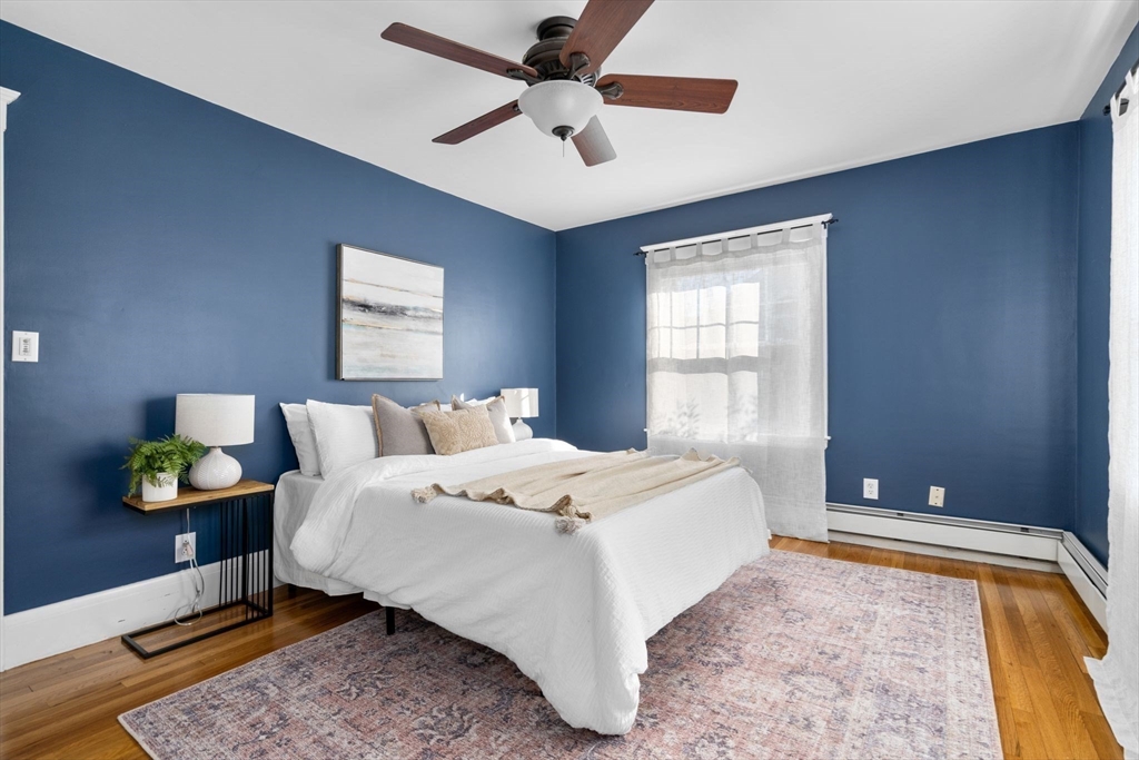 15 Laird Road Medford, MA 02155 - Photo 17 of 42 a bedroom with a bed and a window
