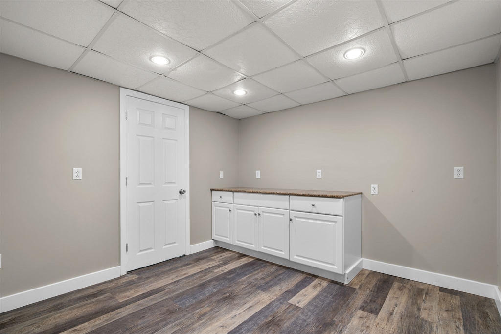 15 Laird Road Medford, MA 02155 - Photo 24 of 42 a view of an empty room with wooden floor