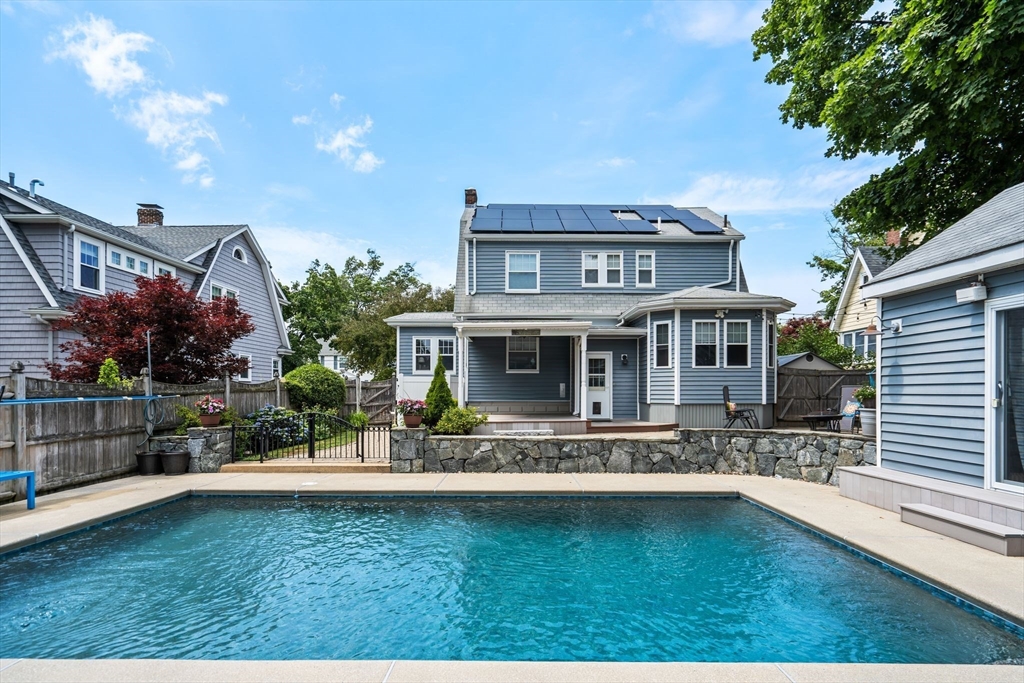 15 Laird Road Medford, MA 02155 - Photo 28 of 42 a front view of a house with a garden