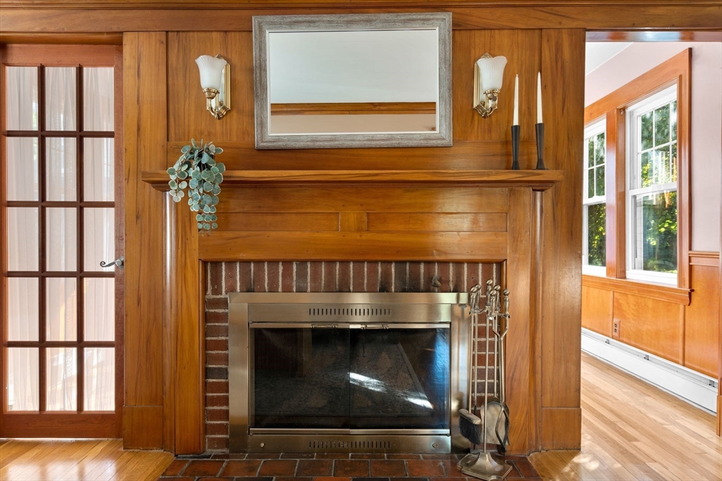 15 Laird Road Medford, MA 02155 - Photo 4 of 42 a close view of a fireplace with wooden floor