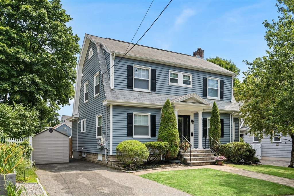 15 Laird Road Medford, MA 02155 - Photo 42 of 42 a front view of a house with a yard