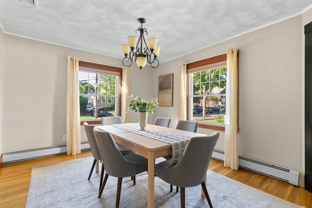 15 Laird Road Medford, MA 02155 - Photo 7 of 42 a view of a dining room with furniture window and outside view